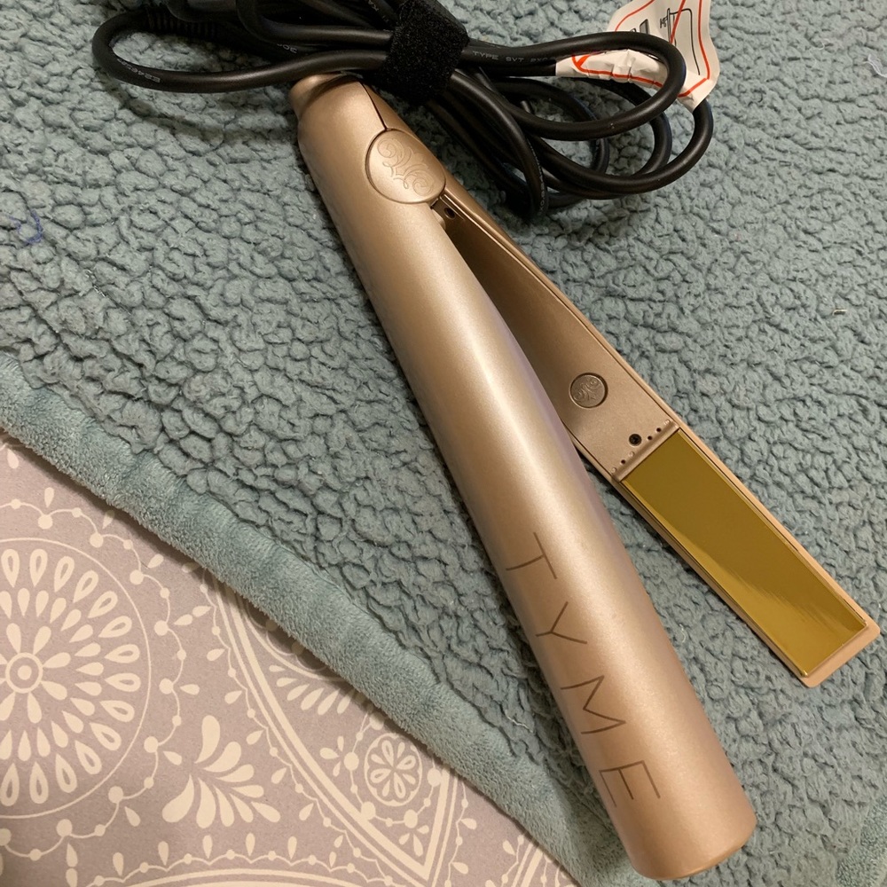 Authentic Tyme curler/straightener.